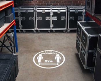Social distance 2m projected safety signage.