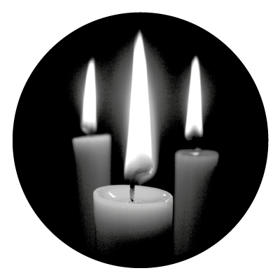 Greyscale image of three lit candles on a black circle gobo.