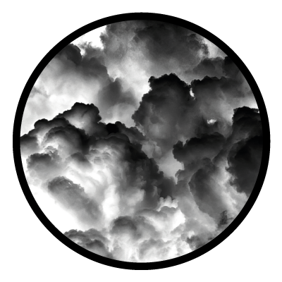 Greyscale image of a stormy cloudy sky on a black circle gobo.