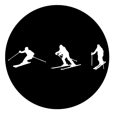 White silhouette of three skiers on a black circle gobo.