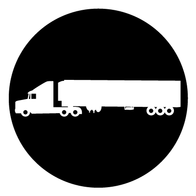 White silhouette of a lorry truck on a black circle gobo.