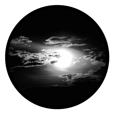 Greyscale image of a sun peeking behind thin clouds on a black circle gobo.