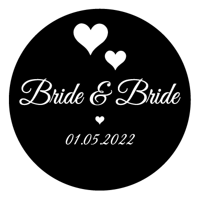 White "bride & bride" text with 2 white hearts above.
Underneath this is a small white heart and the text "01.05.22" in white. All on a black circle.