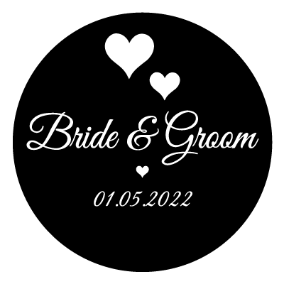 White "bride & groom" text with 2 white hearts above.
Underneath this is a small white heart and the text "01.05.22" in white. All on a black circle.