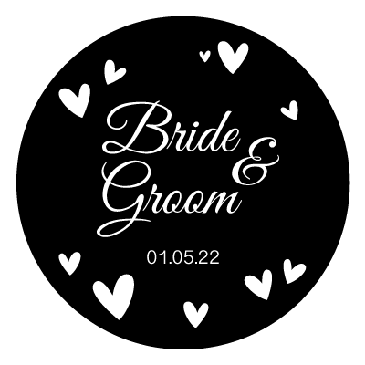 White stacked "bride & groom" text with white hearts surrounding. With white "01.05.22" underneath the text. All on a black circle.