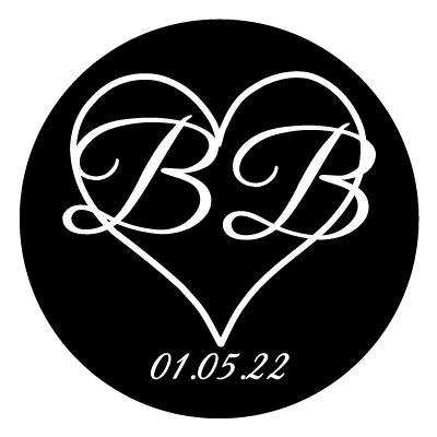 White heart outline with large "BB" in white inside the heart. Text below the heart is "01.05.22".  All on a black circle.