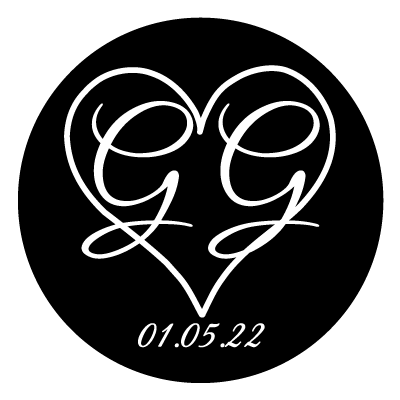 White heart outline with large "GG" in white inside the heart. Text below the heart is "01.05.22". All on a black circle.