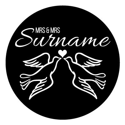 "Mrs & Mrs Surname" text. Below this is a heart with an illustration on two doves facing each other. All white on a black circle.
