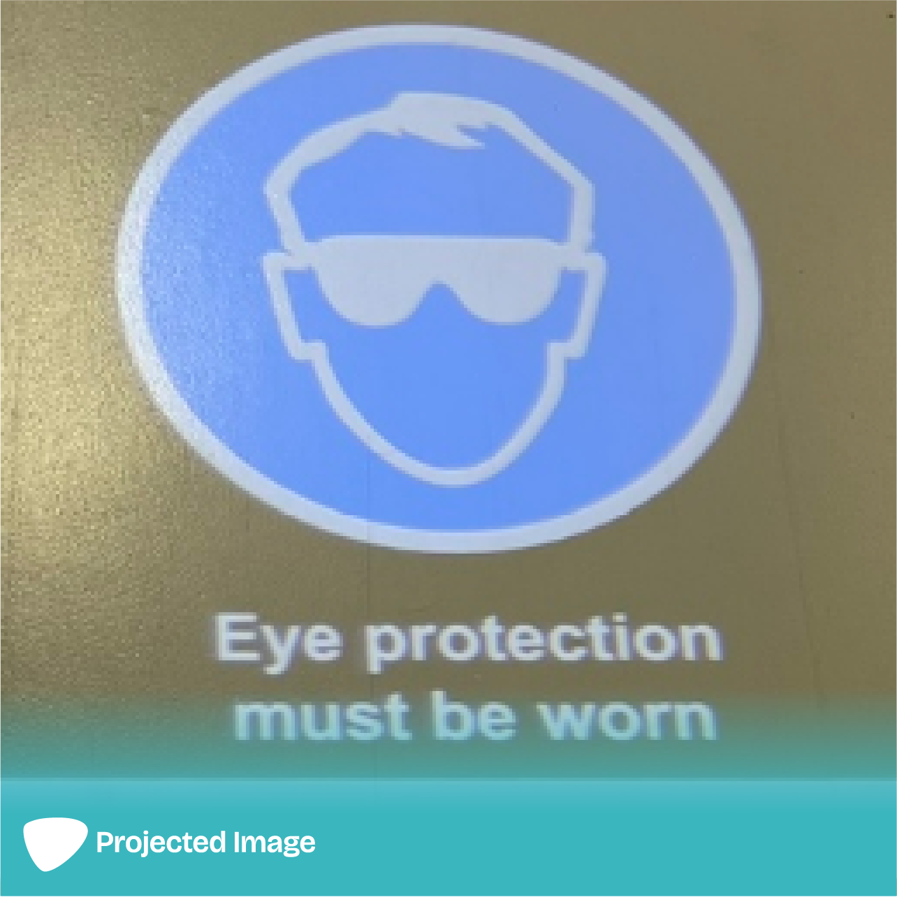 Projection of 'Eye Protection' signage on a floor