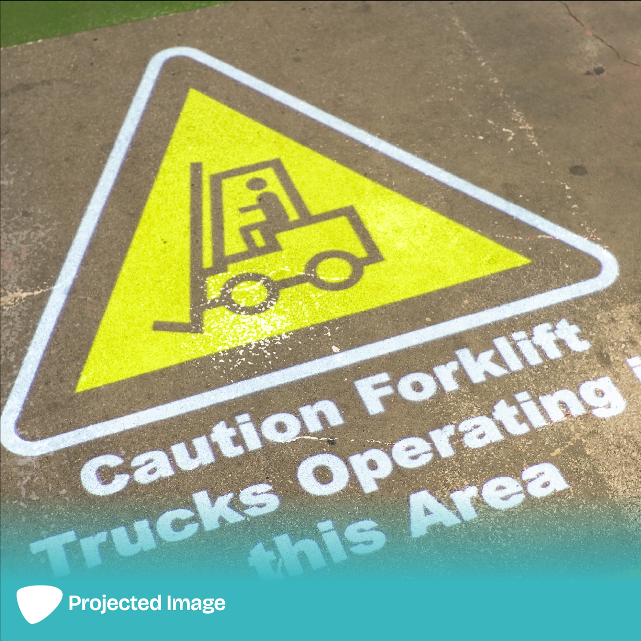 Projection of a 'Caution Forklift' sign on a floor