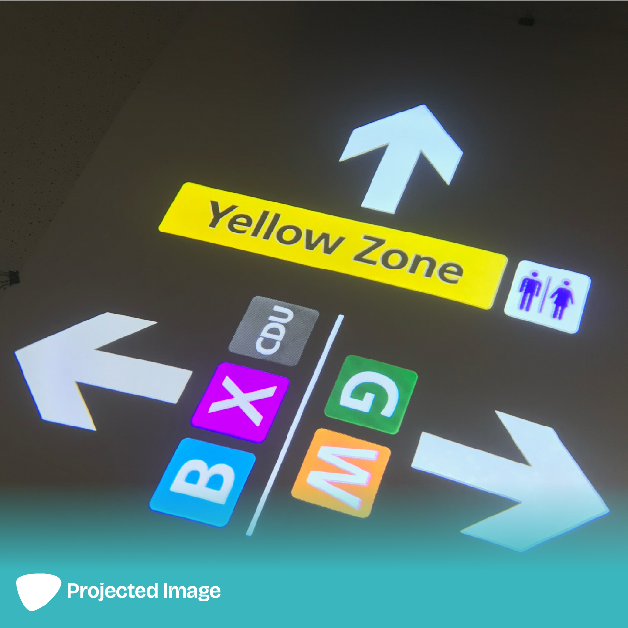 Projection of a way finding sign on a ceiling