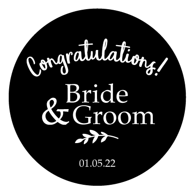 White curved "Congratulations!" text. Below this is stacked "Bride & Groom" text with a small leaf illustration and "01.05.22". All white on a black circle.